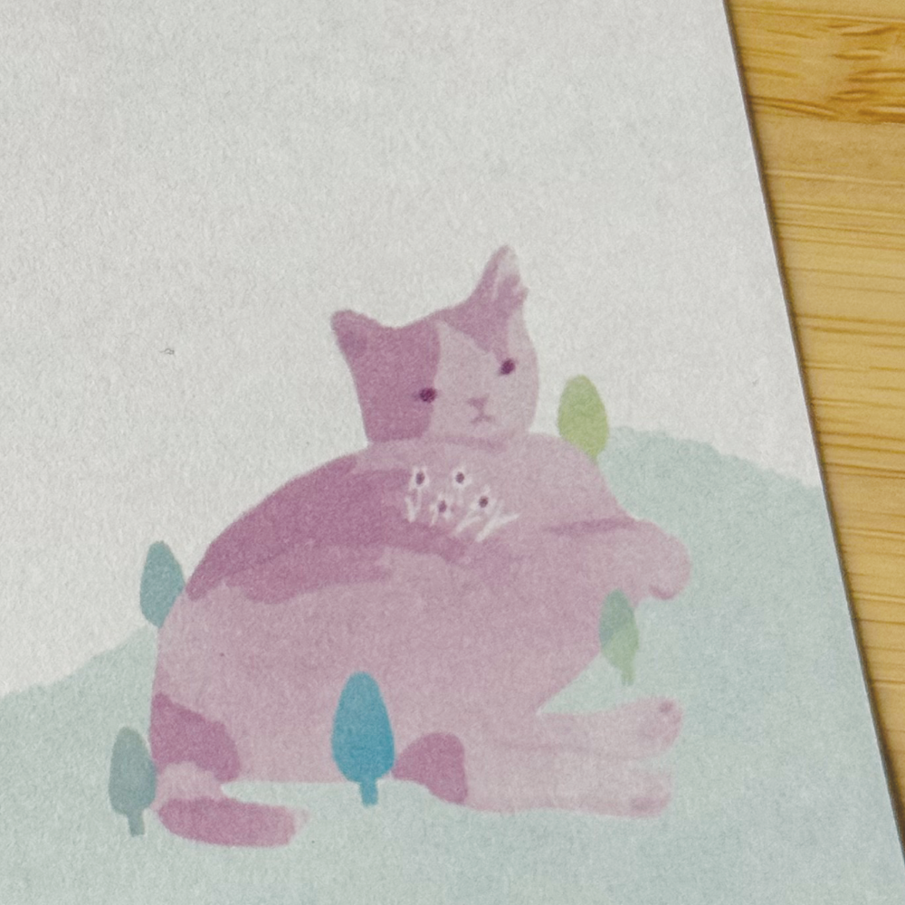 Closeup of stationery featuring little party icons