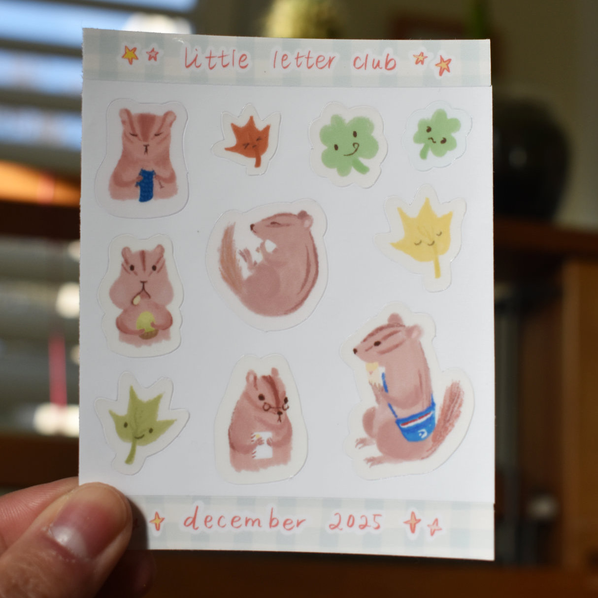 Closeup of stickers featuring chipmunks and other cute characters