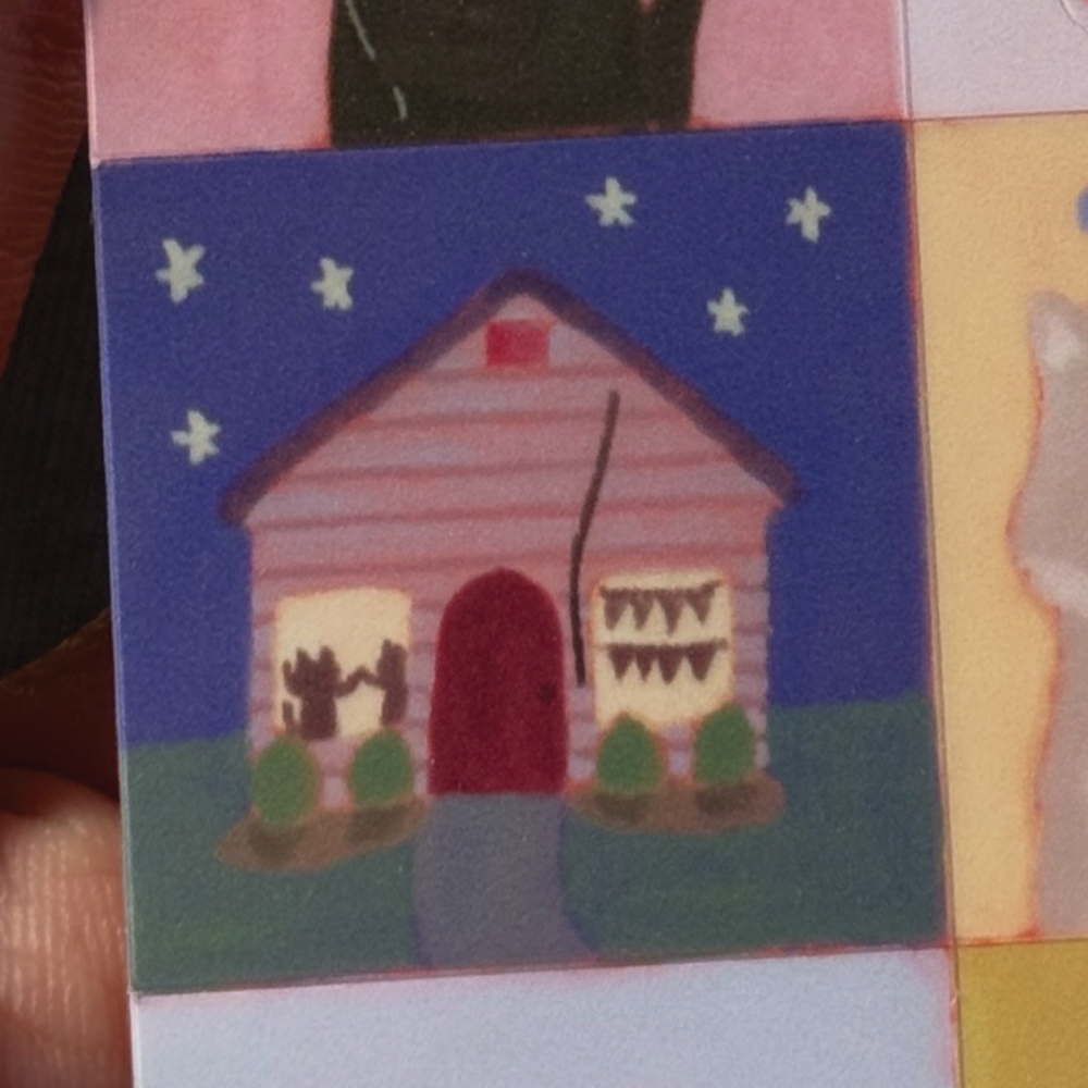 Closeup of stickers featuring cats and balloons